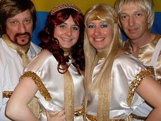 Christmas party tribute act performing live